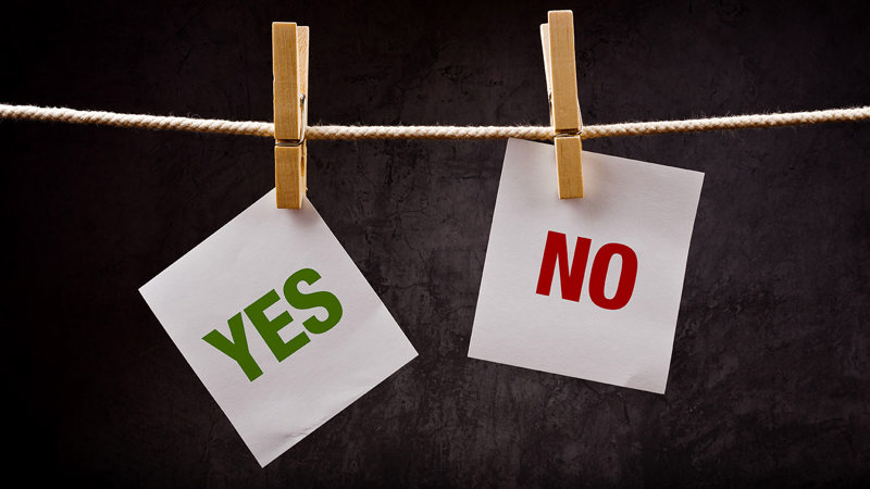 Papper med yes och no på